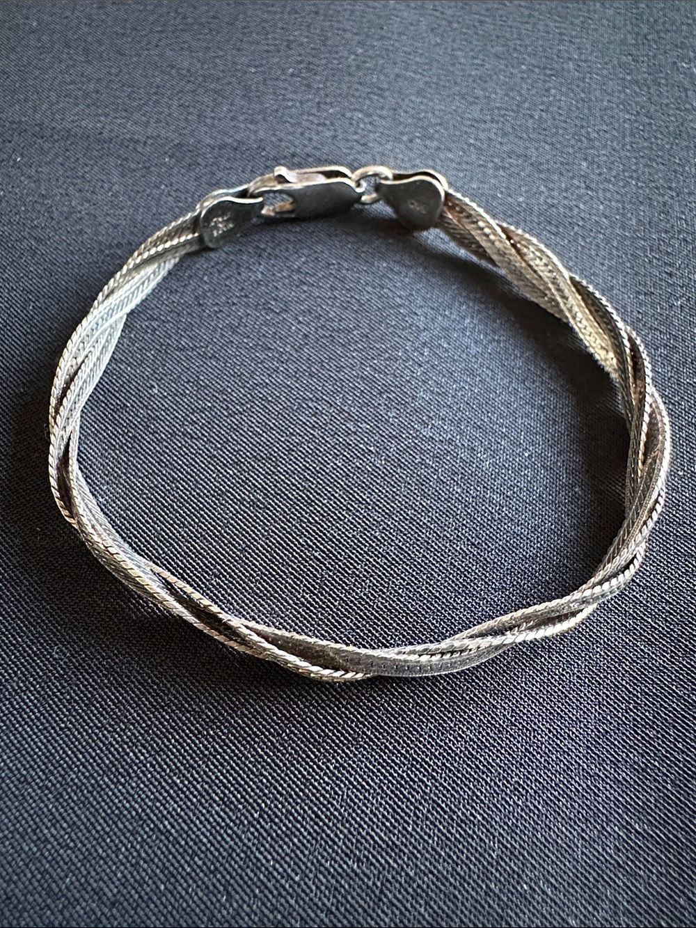 Sterling silver EUC twisted herringbone bracelet. Stamped 925 Italy. Sz 6-1/2”
